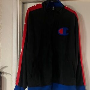 Champion Black Jacket with Red and Blue Accents